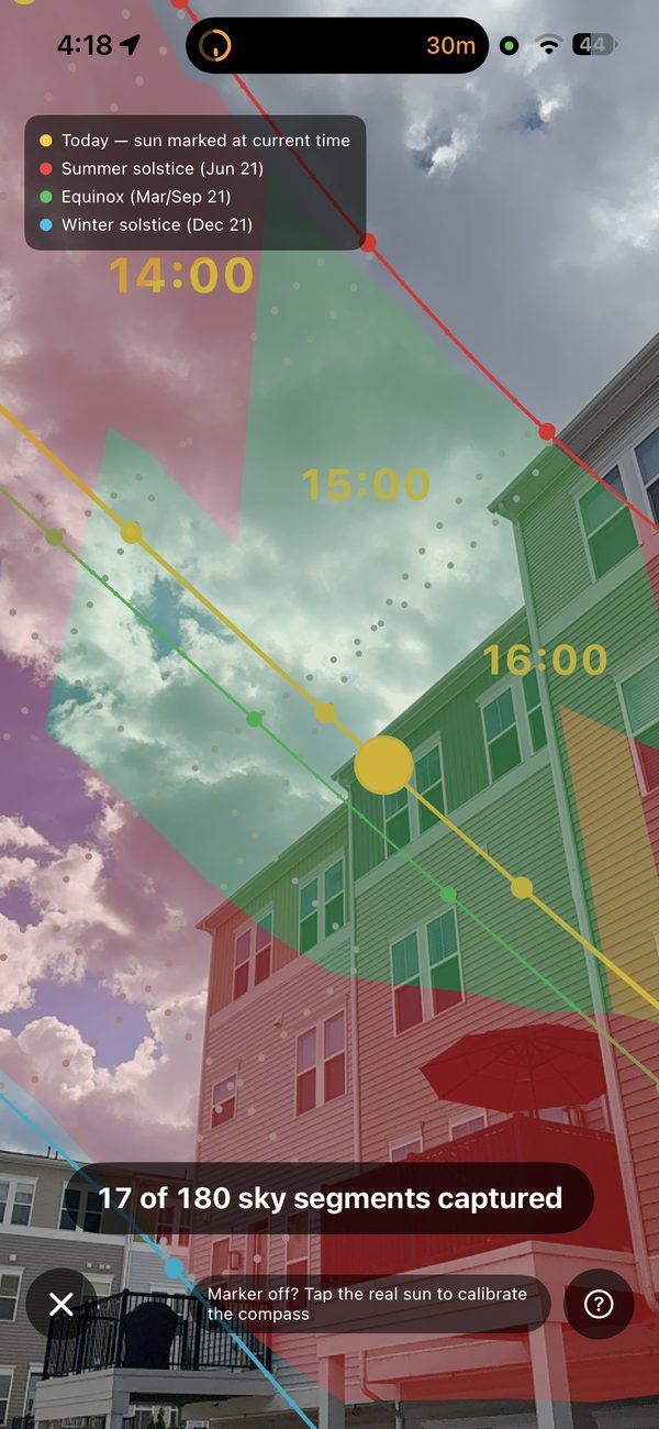 AR sun path view mid-sweep with the annual envelope filling in